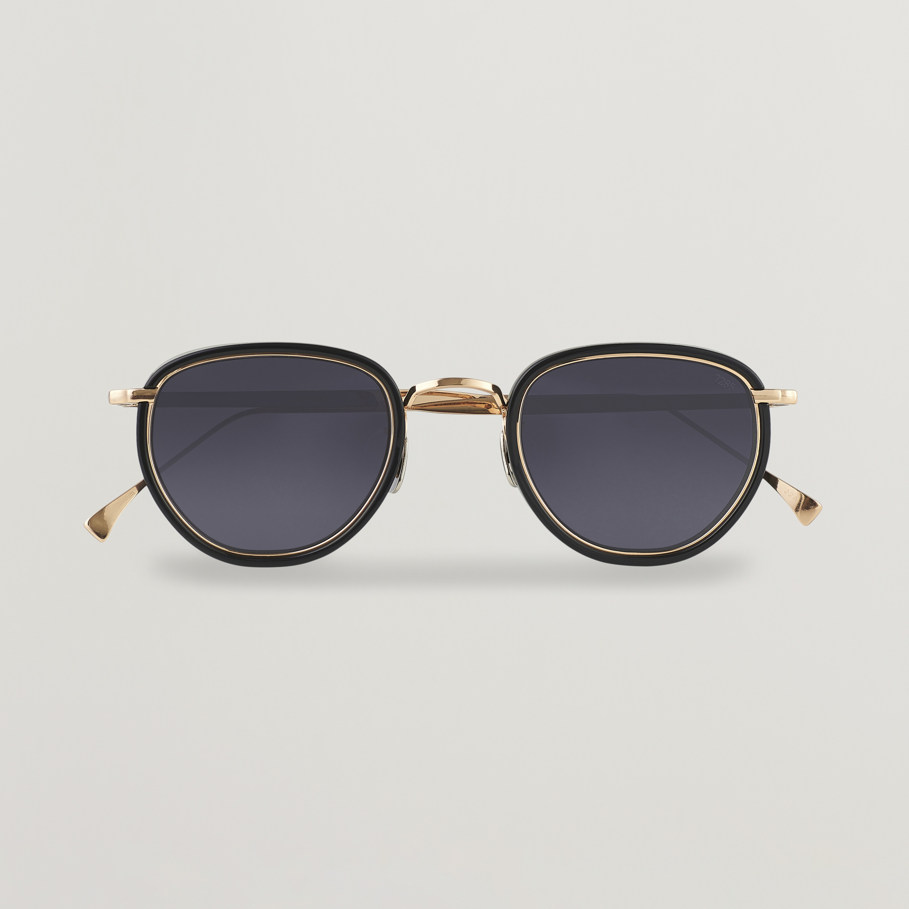 Eyevan 7285 797 Sunglasses Black/Gold at CareOfCarl.com