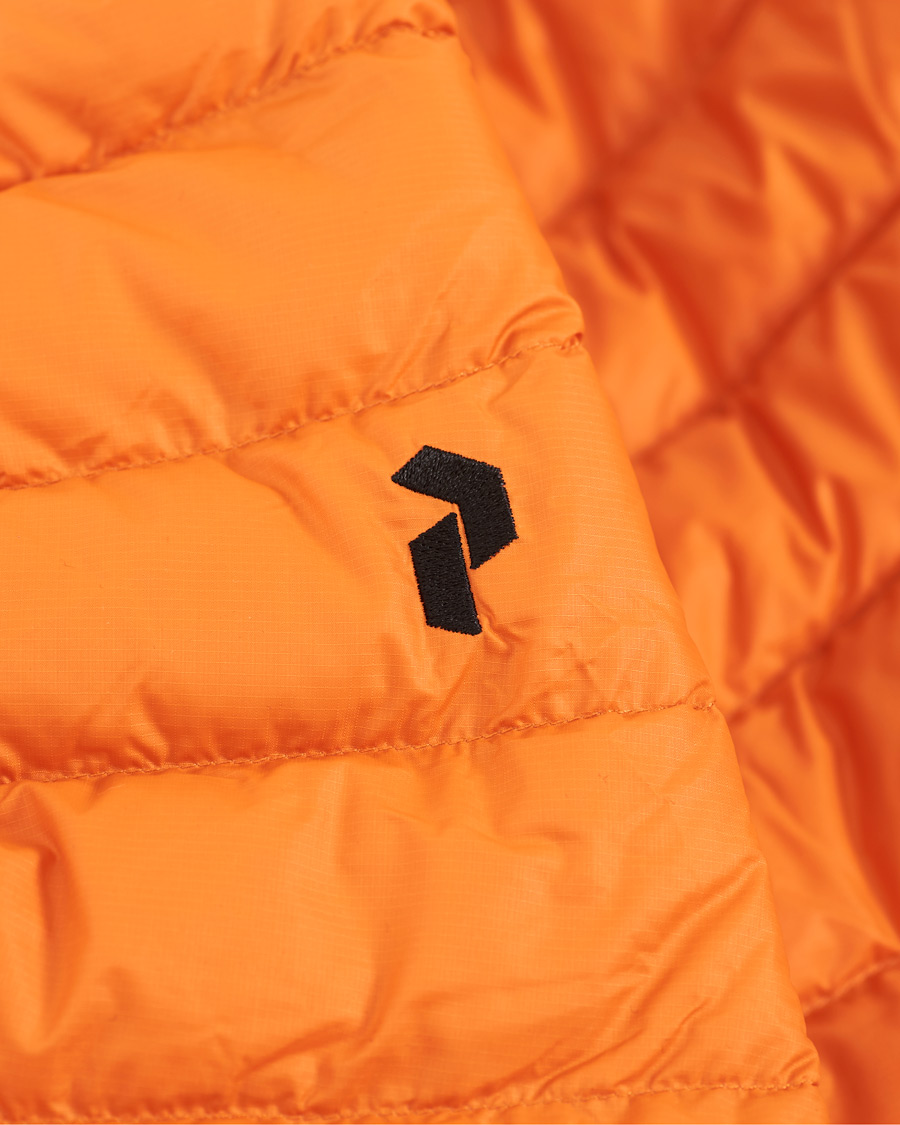 Men | Coats & Jackets | Peak Performance | Frost Liner Down Hooded Jacket Blaze Tundra