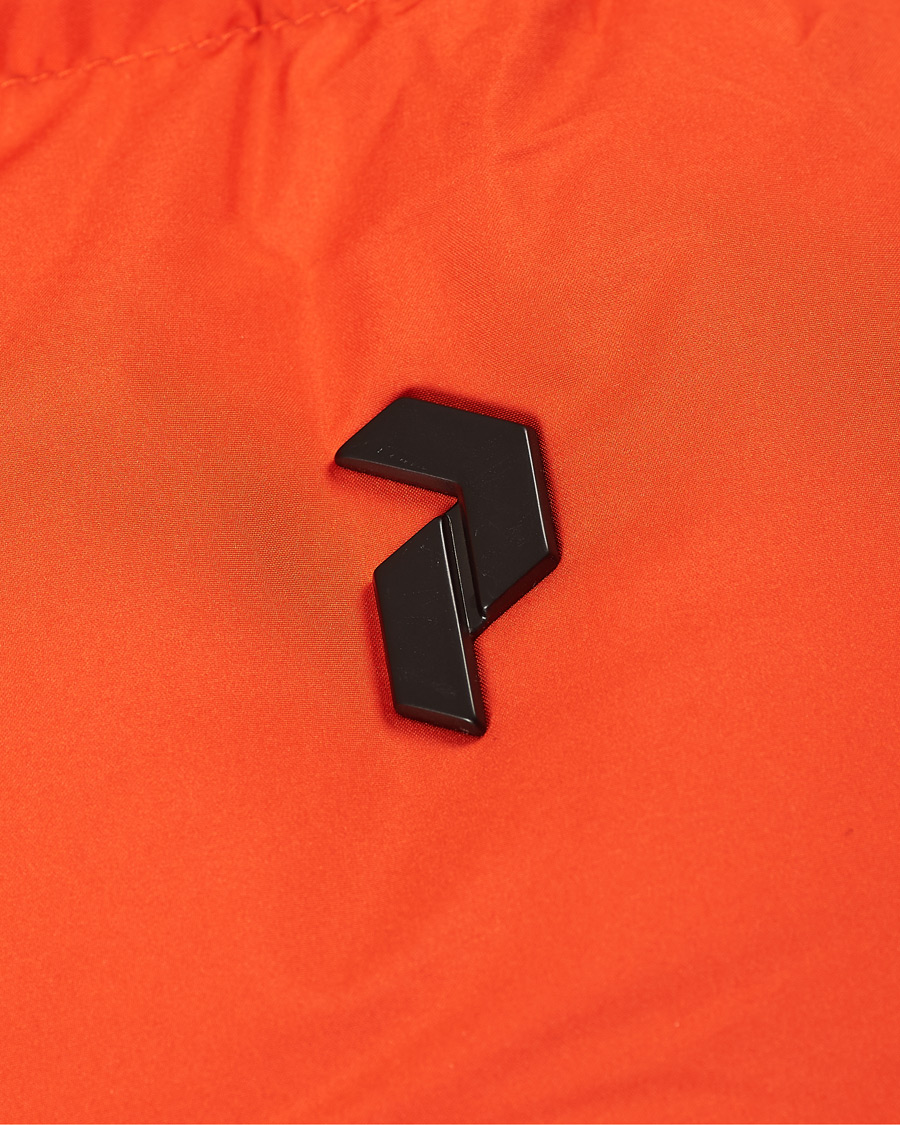 Men | Coats & Jackets | Peak Performance | Rivel Down Hooded Jacket Orange