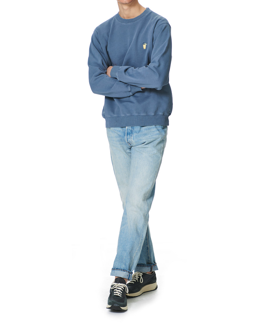 Men | Sweaters & Knitwear | Nudie Jeans | Lasse Drink Sweatshirt 50's Blue