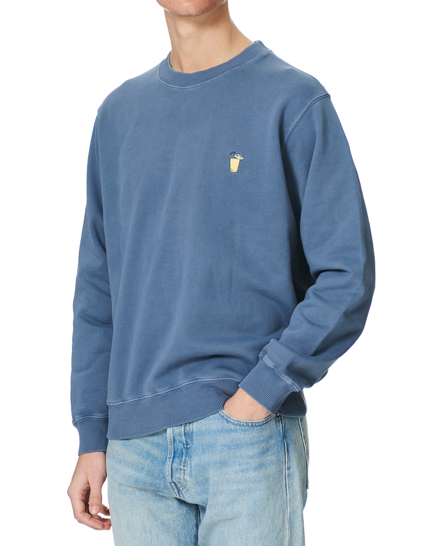 Men | Sweaters & Knitwear | Nudie Jeans | Lasse Drink Sweatshirt 50's Blue