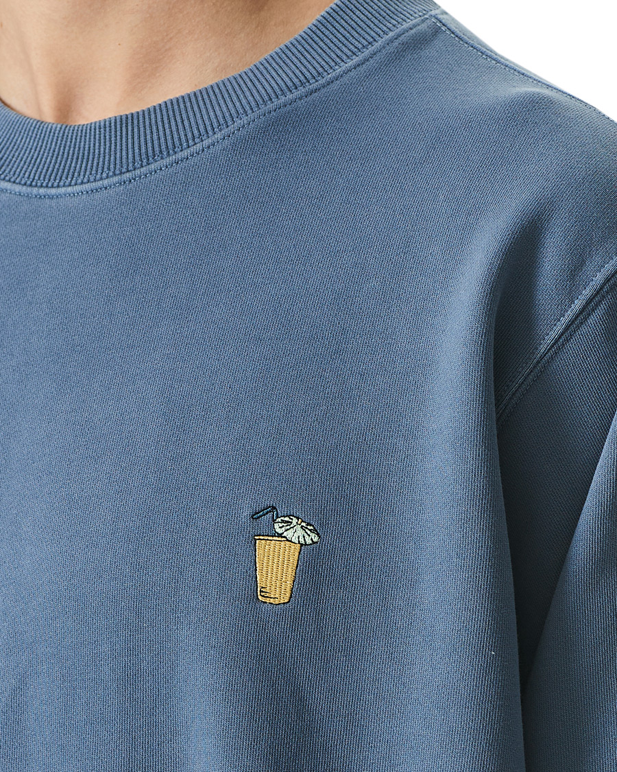 Men | Sweaters & Knitwear | Nudie Jeans | Lasse Drink Sweatshirt 50's Blue