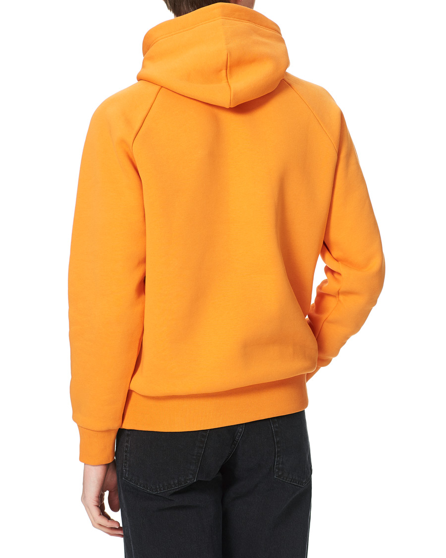 Men | Sweaters & Knitwear | Peak Performance | Original Logo Hoodie Orange Flare