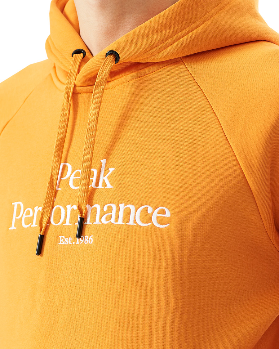 Men | Sweaters & Knitwear | Peak Performance | Original Logo Hoodie Orange Flare