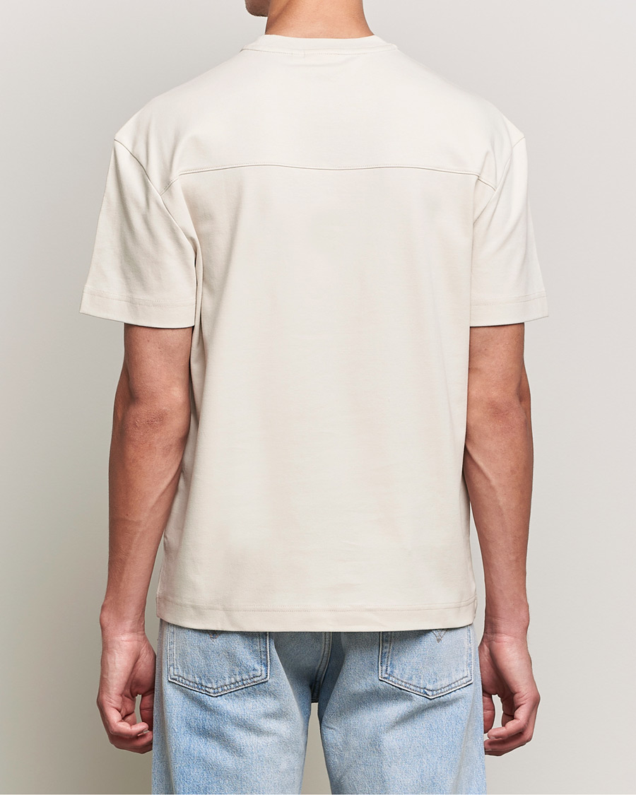 Men | T-Shirts | Calvin Klein | Debossed Logo Crew Neck Tee Stony Beige