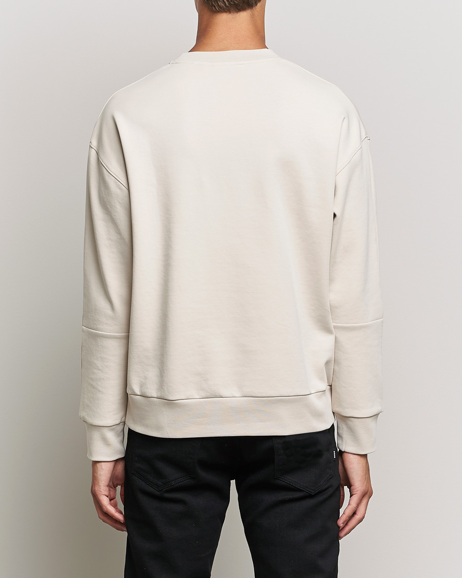 Men | Sweaters & Knitwear | Calvin Klein | Debossed Logo Crew Neck Sweatshirt Stony Beige