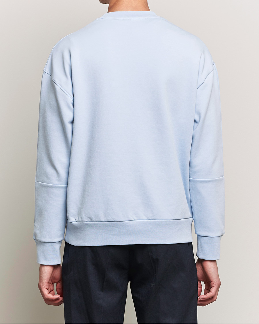 Men | Sweaters & Knitwear | Calvin Klein | Debossed Logo Crew Neck Sweatshirt Bayshore Blue