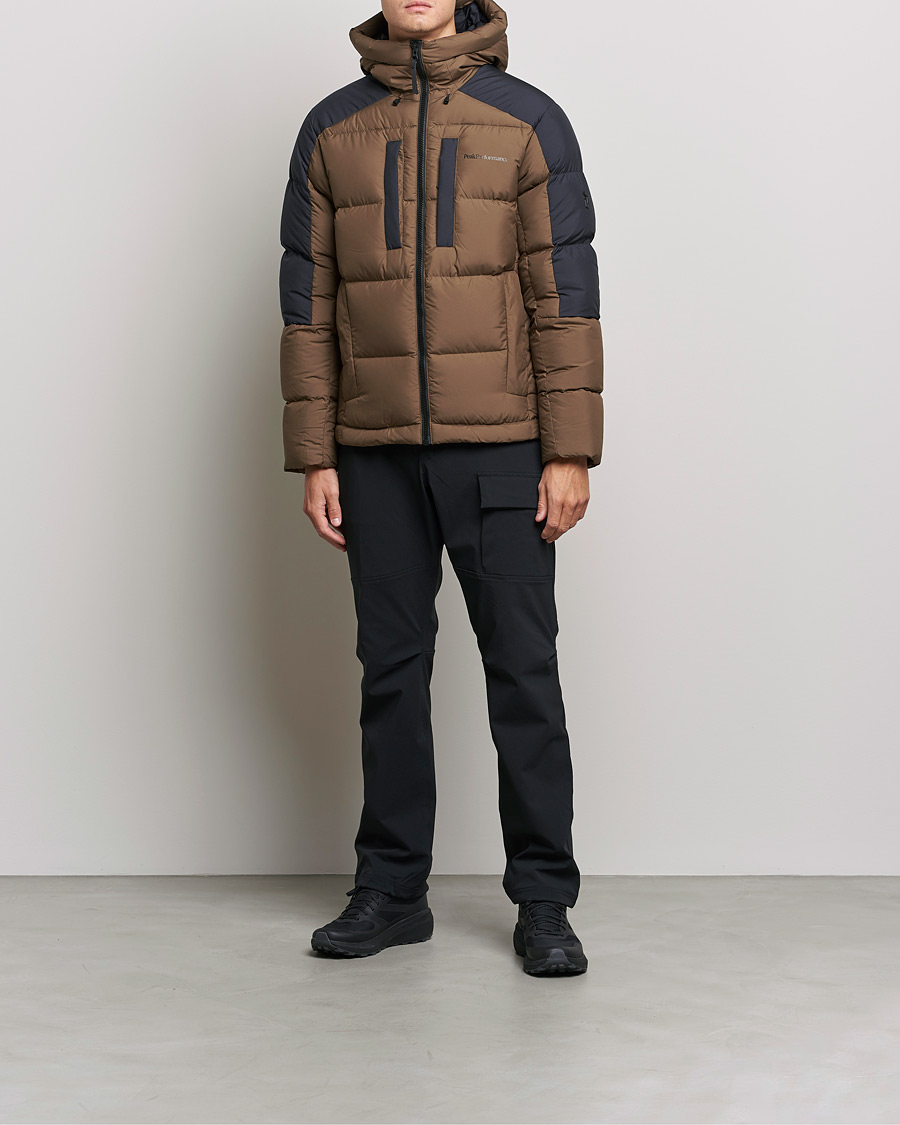 Men | Coats & Jackets | Peak Performance | Rivel Down Seasonal Hooded Jacket Woody Black