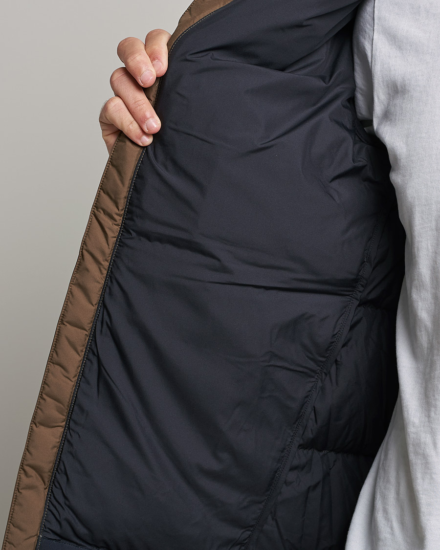 Men | Coats & Jackets | Peak Performance | Rivel Down Seasonal Hooded Jacket Woody Black