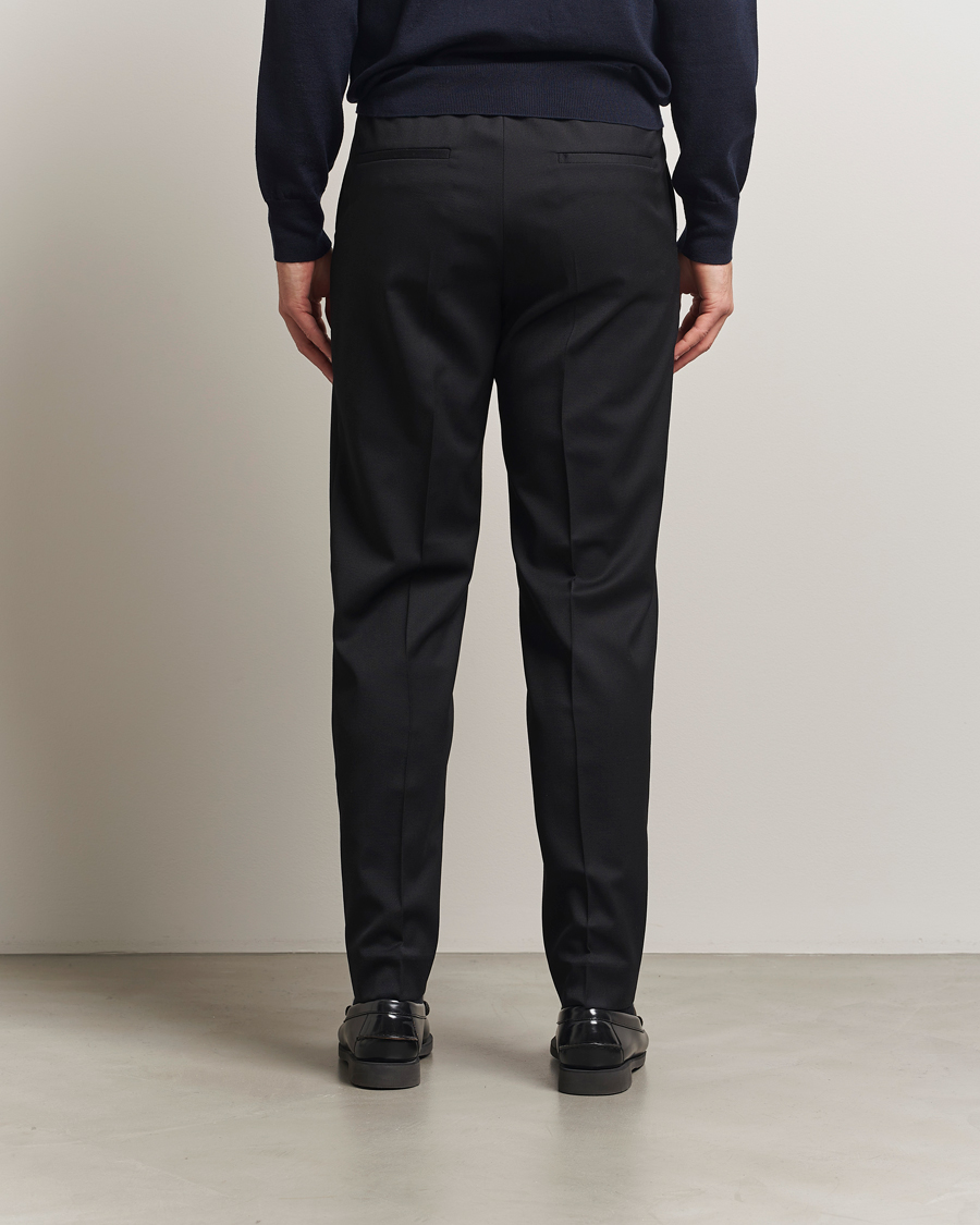 Men | Trousers | Filippa K | Relaxed Terry Wool Trousers Black
