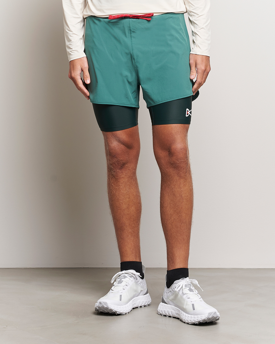 Men | Shorts | District Vision | Layered Pocketed Trail Shorts Pine