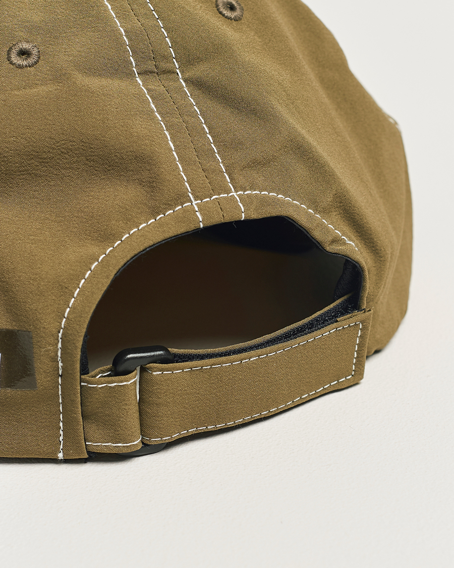 Men | Satisfy PeaceShell Running Cap Oil Green | Satisfy | PeaceShell Running Cap Oil Green