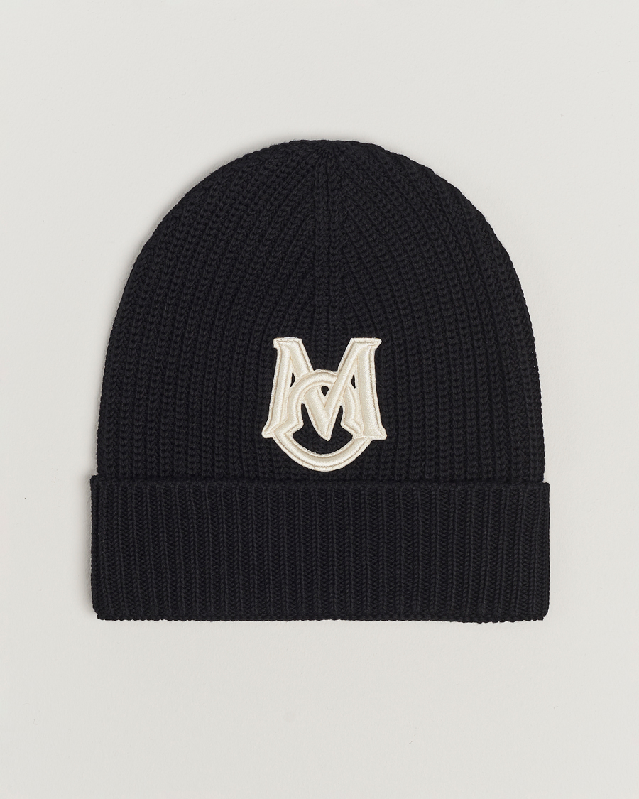 Moncler Logo Embossed Beanie Black at CareOfCarl.com