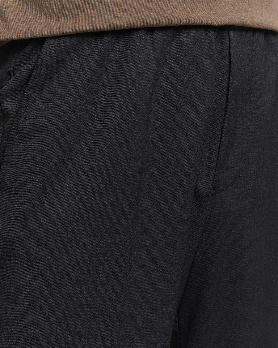 Men | Trousers | Filippa K | Relaxed Terry Wool Trousers Anthracite