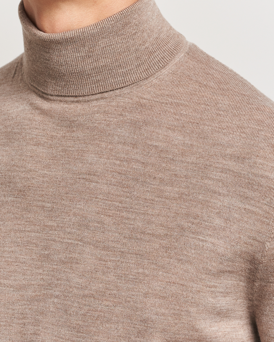 Men | Sweaters & Knitwear | Tiger of Sweden | Nevile Extra Fine Merino Polo Beige Melange