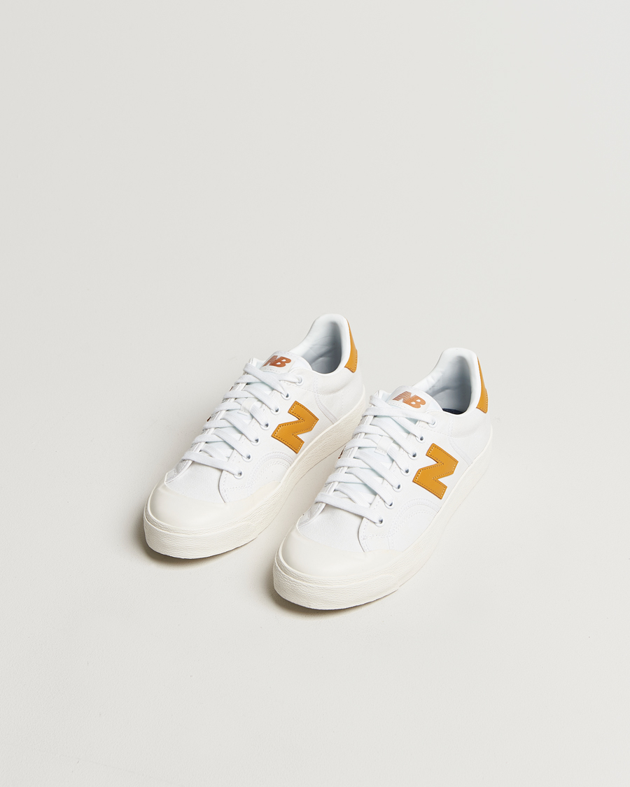 Men | New Balance B100 Sneakers White/Yellow | New Balance | B100 Sneakers White/Yellow