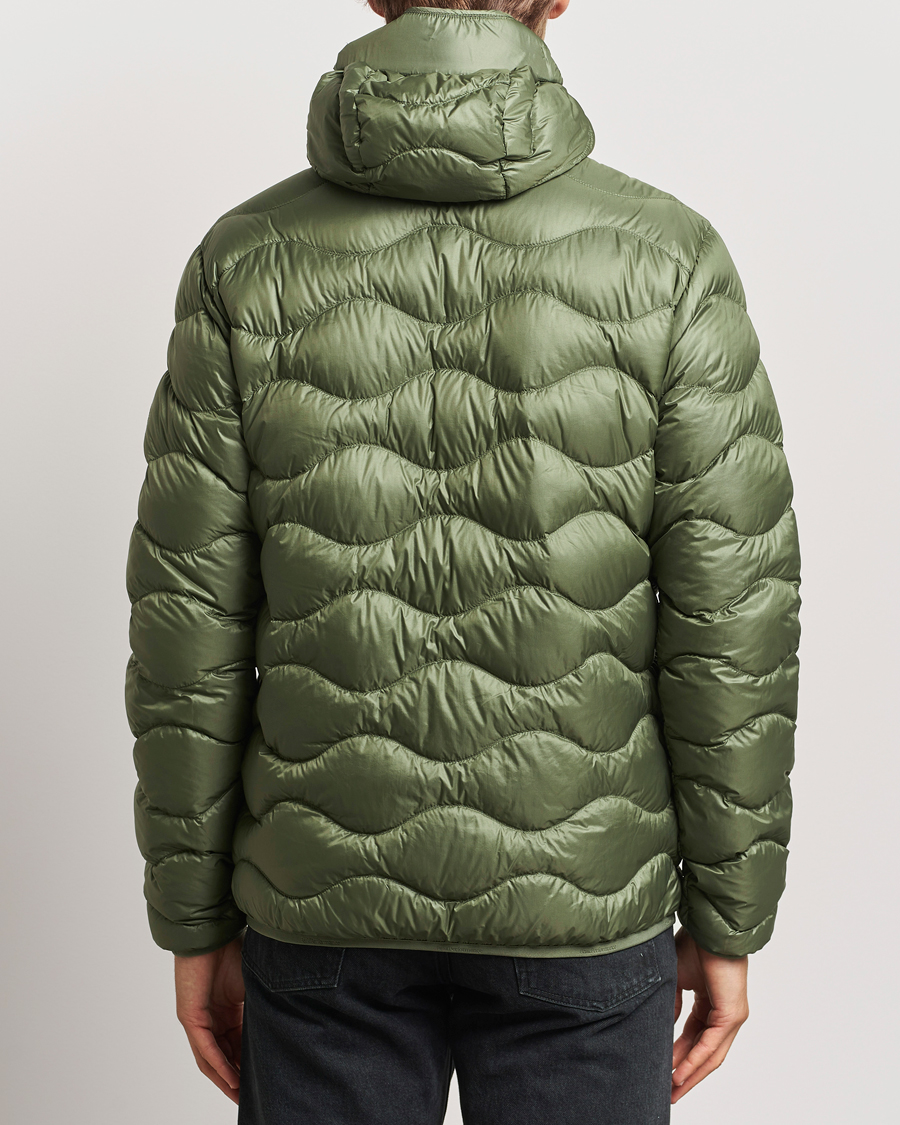Men | Coats & Jackets | Peak Performance | Helium Down Hooded Jacket Pine Needle