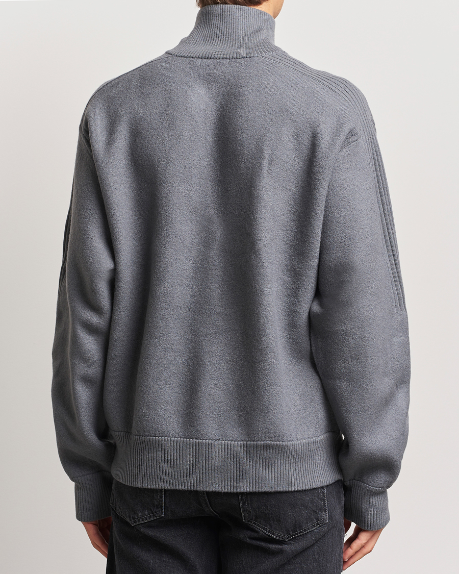 Men | Sweaters & Knitwear | J.Lindeberg | Bon Boiled Wool Quarter Zip Lava Smoke