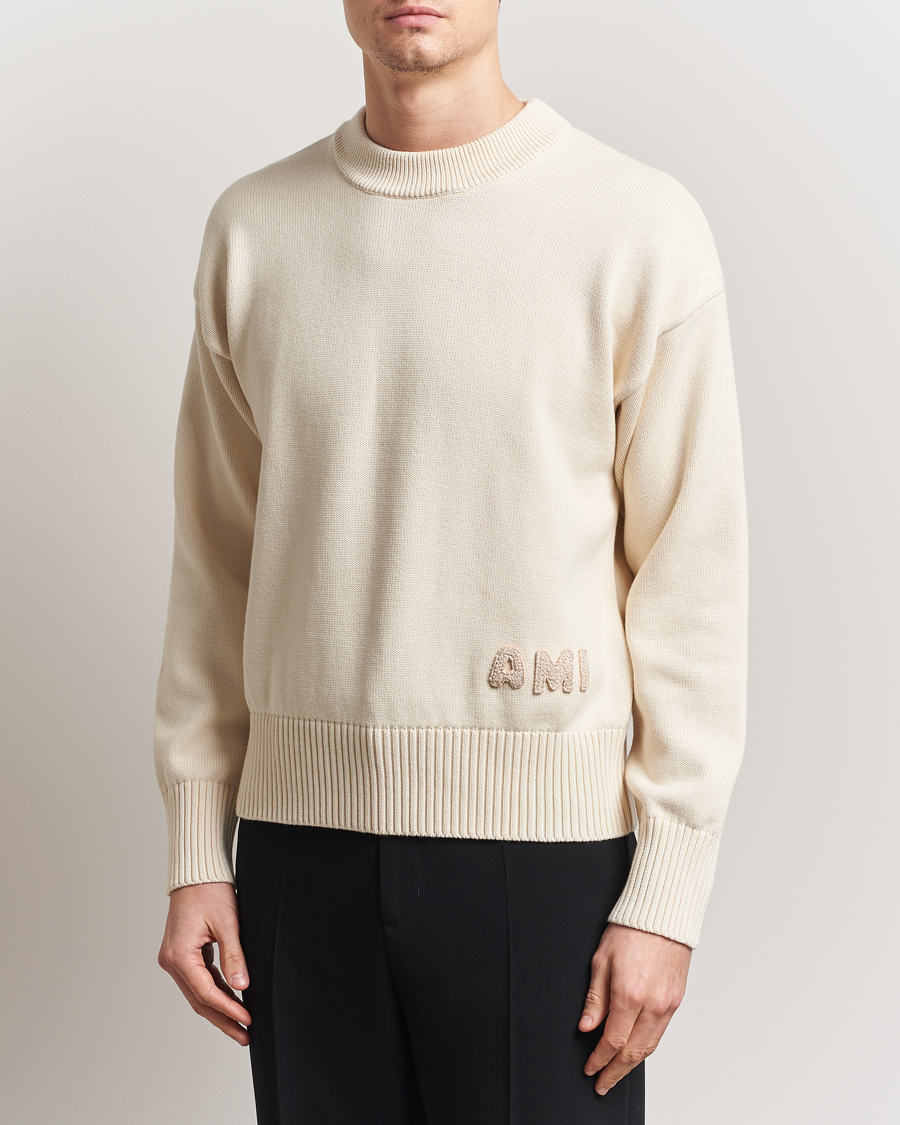 Men | Sweaters & Knitwear | AMI | Embroidered Logo Knitted Sweater White Cream