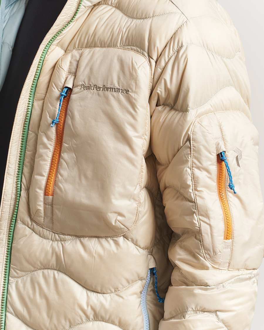 Men | Coats & Jackets | Peak Performance | Helium Utility Down Hooded Jacket Sand Fog