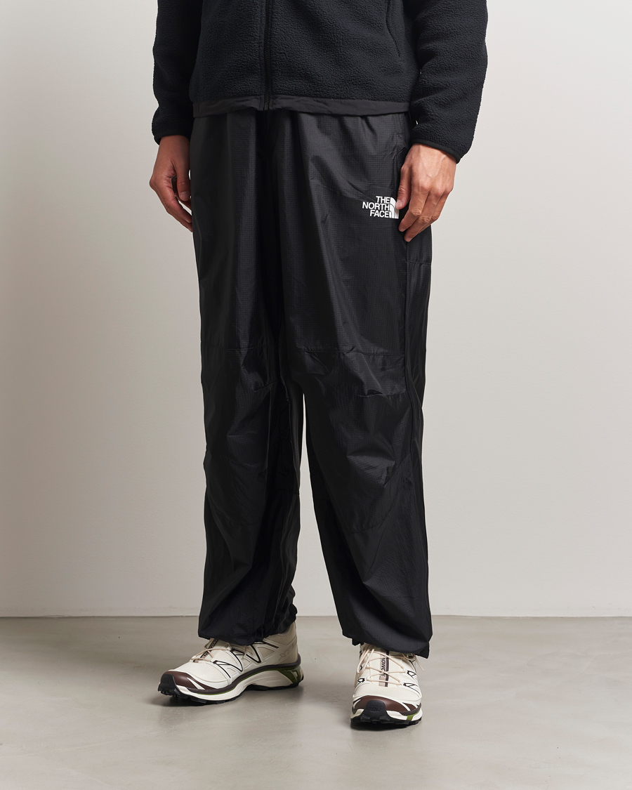 Men | Trousers | The North Face | NSE Wind Track Pants Black