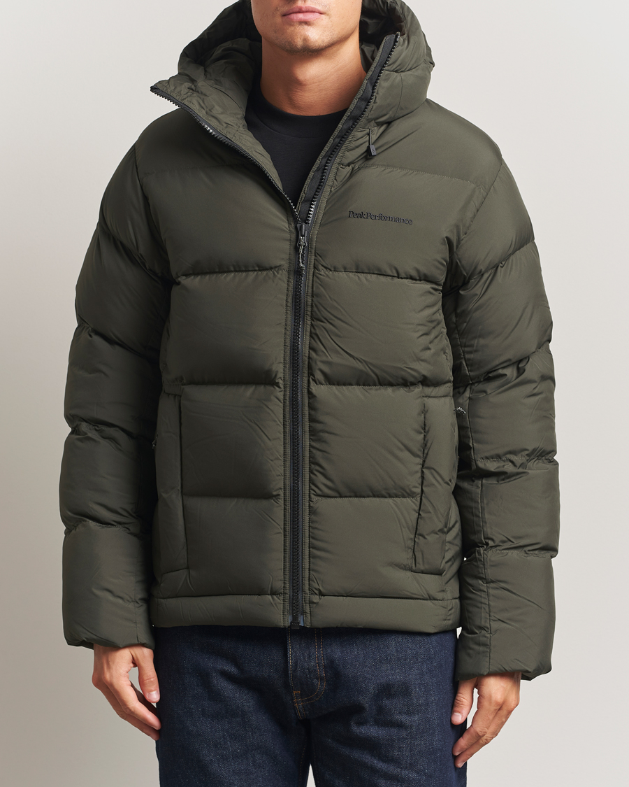 Men | Coats & Jackets | Peak Performance | Rivel Down Hooded Jacket Olive Extreme
