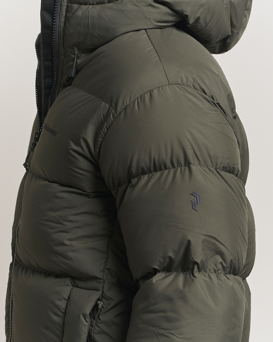 Men | Coats & Jackets | Peak Performance | Rivel Down Hooded Jacket Olive Extreme