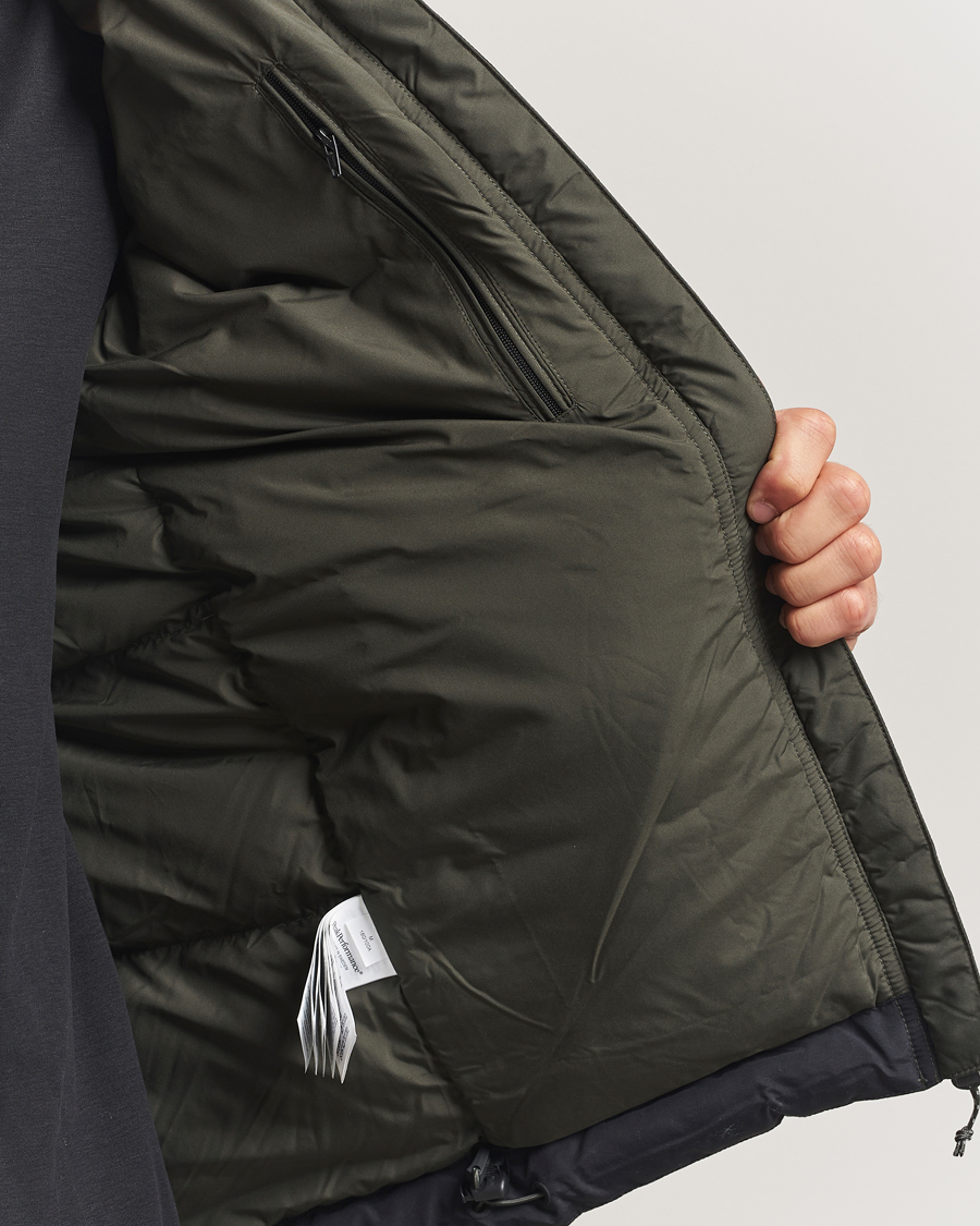 Men | Coats & Jackets | Peak Performance | Rivel Down Hooded Jacket Olive Extreme