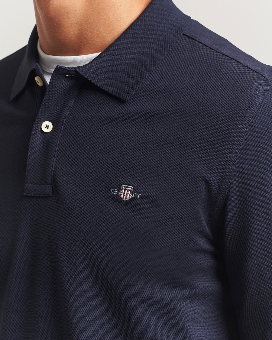Men | Polo Shirts | GANT | Regular Shield Long Sleeve Polo Evening Blue