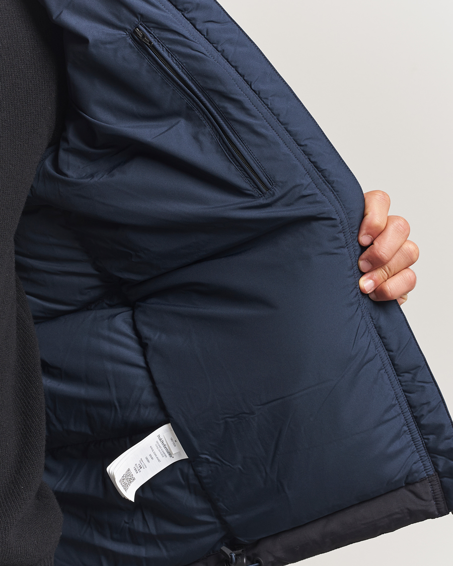 Men | Coats & Jackets | Peak Performance | Rivel Down Hooded Jacket Blue Shadow