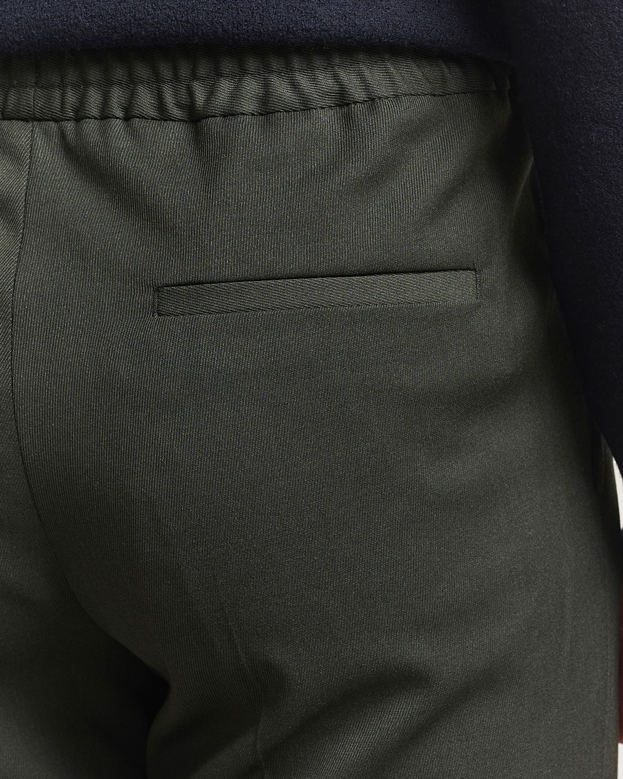 Men | Trousers | Filippa K | Theo Relaxed Wool Trousers Green Melange