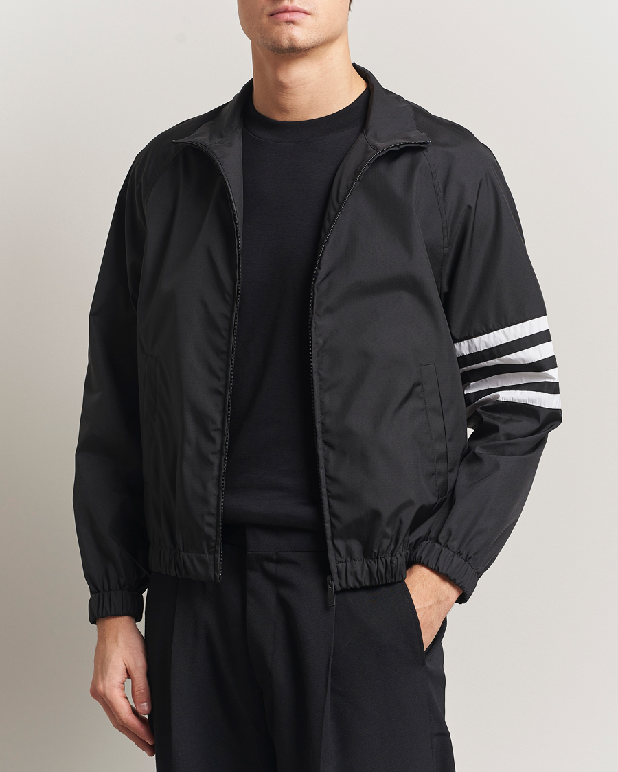 Thom Browne Raglan 4 Bar Nylon Jacket Black at CareOfCarl.com