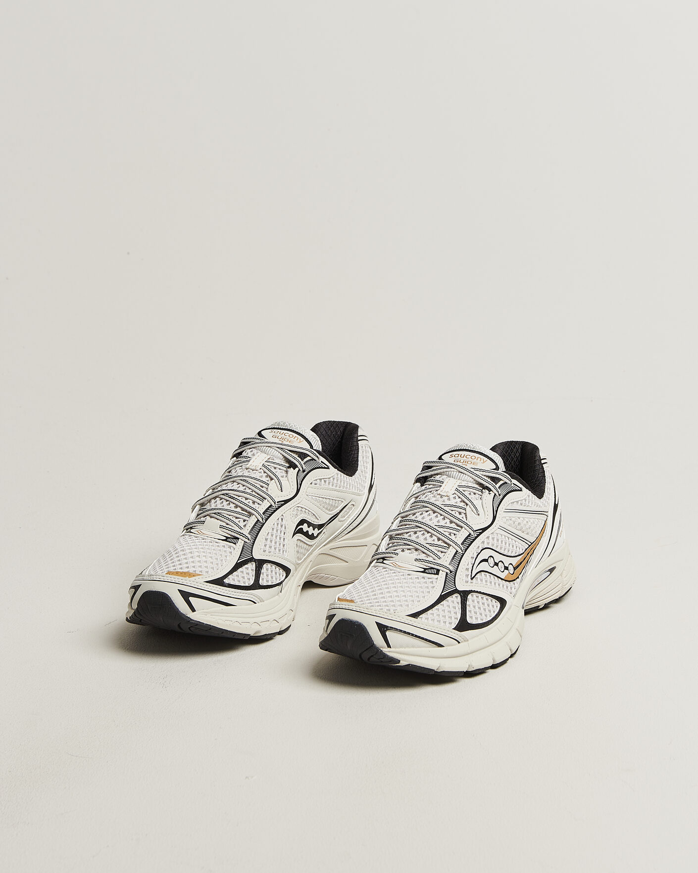 Men | Sneakers | Saucony | Guide 7 Running Sneaker Onyx/Gold