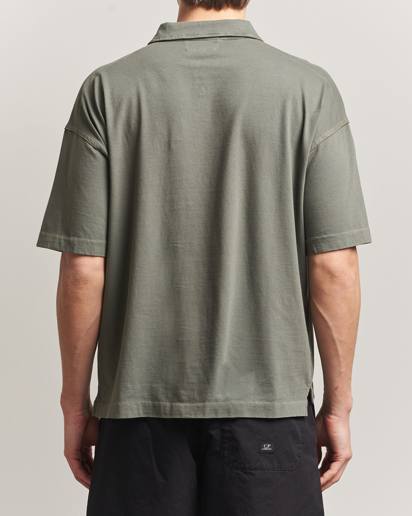 Men | Polo Shirts | C.P. Company | Boxy Fit Cotton Logo Polo Dark Green
