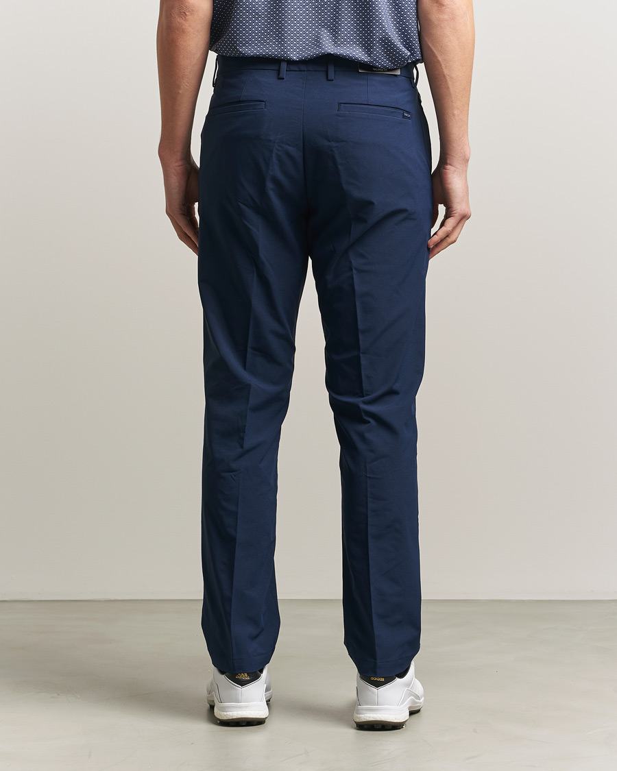 RLX Ralph Lauren Flat Front Golf Pants Refined Navy at CareOfCarl.com