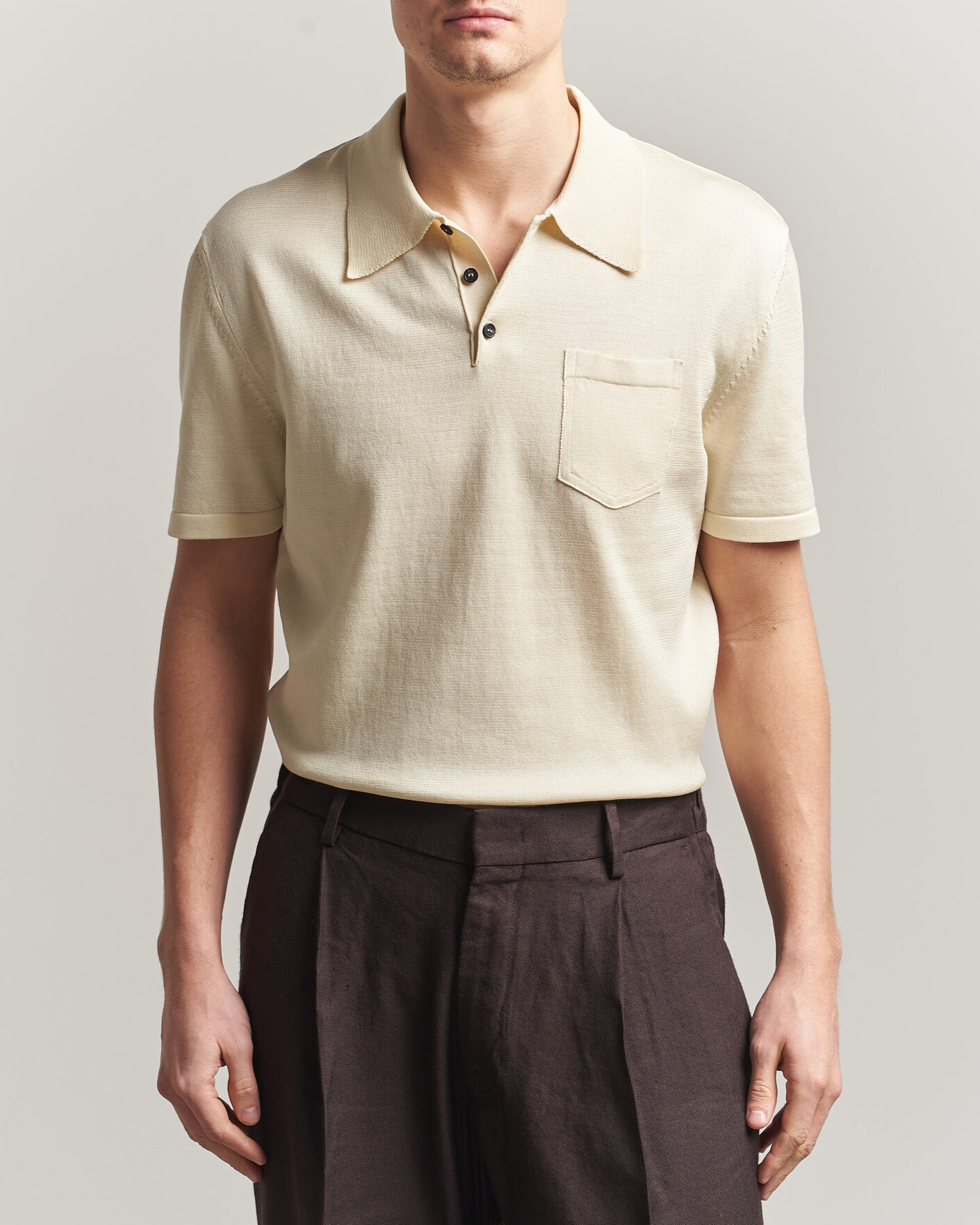 Auralee Wool Rib Knit Skipper Polo Ecru at CareOfCarl.com