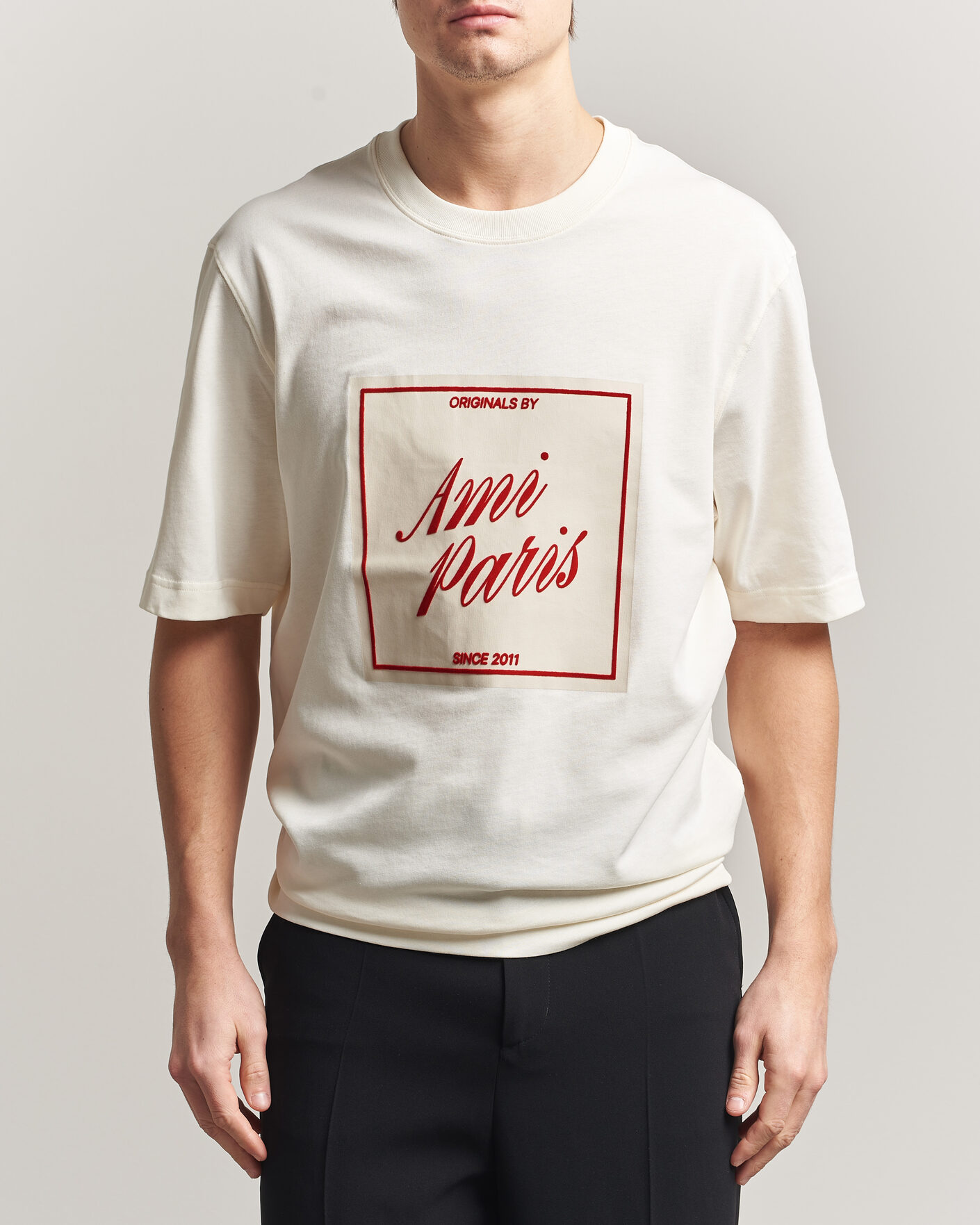 AMI Boxy Fit Printed T-Shirt Creme at CareOfCarl.com