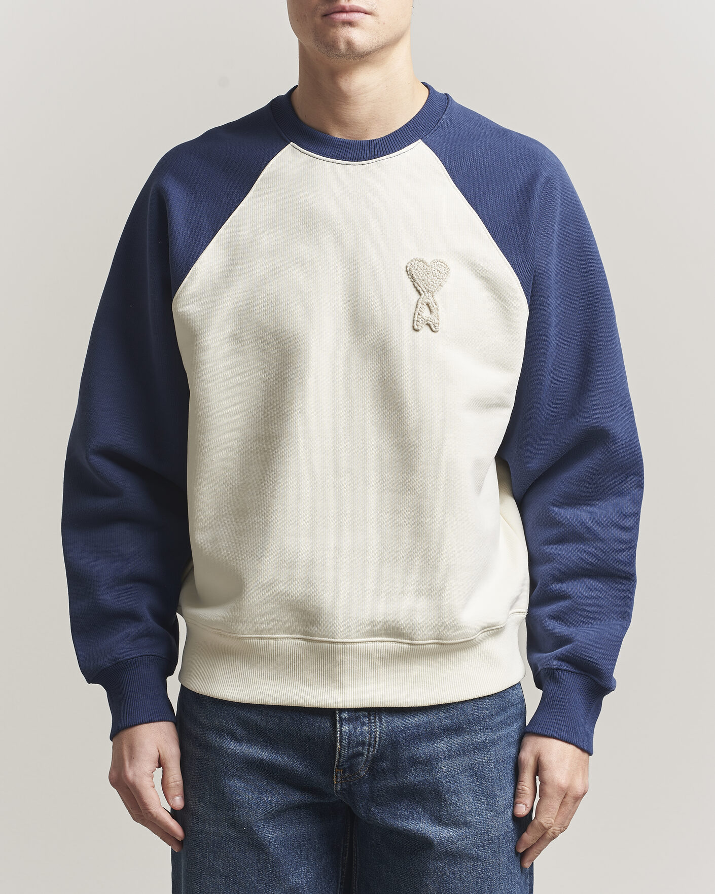 Men | Sweaters & Knitwear | AMI | Knitted Heart Logo Sweatshirt Creme/Navy