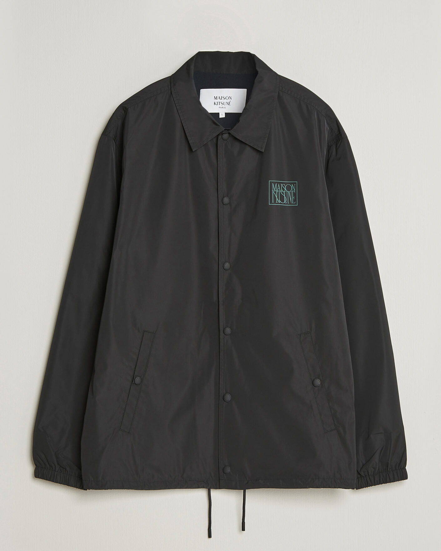 Men | Coats & Jackets | Maison Kitsuné | Tonal Fox Head Coach Jacket Black