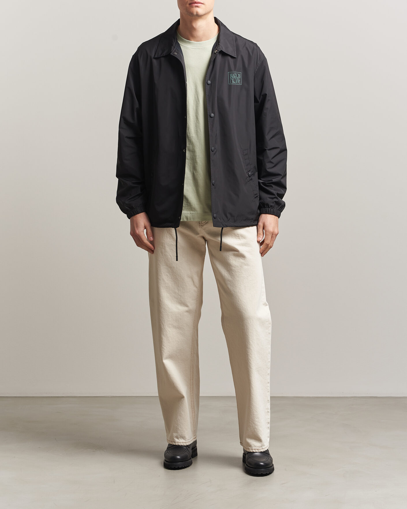 Men | Coats & Jackets | Maison Kitsuné | Tonal Fox Head Coach Jacket Black