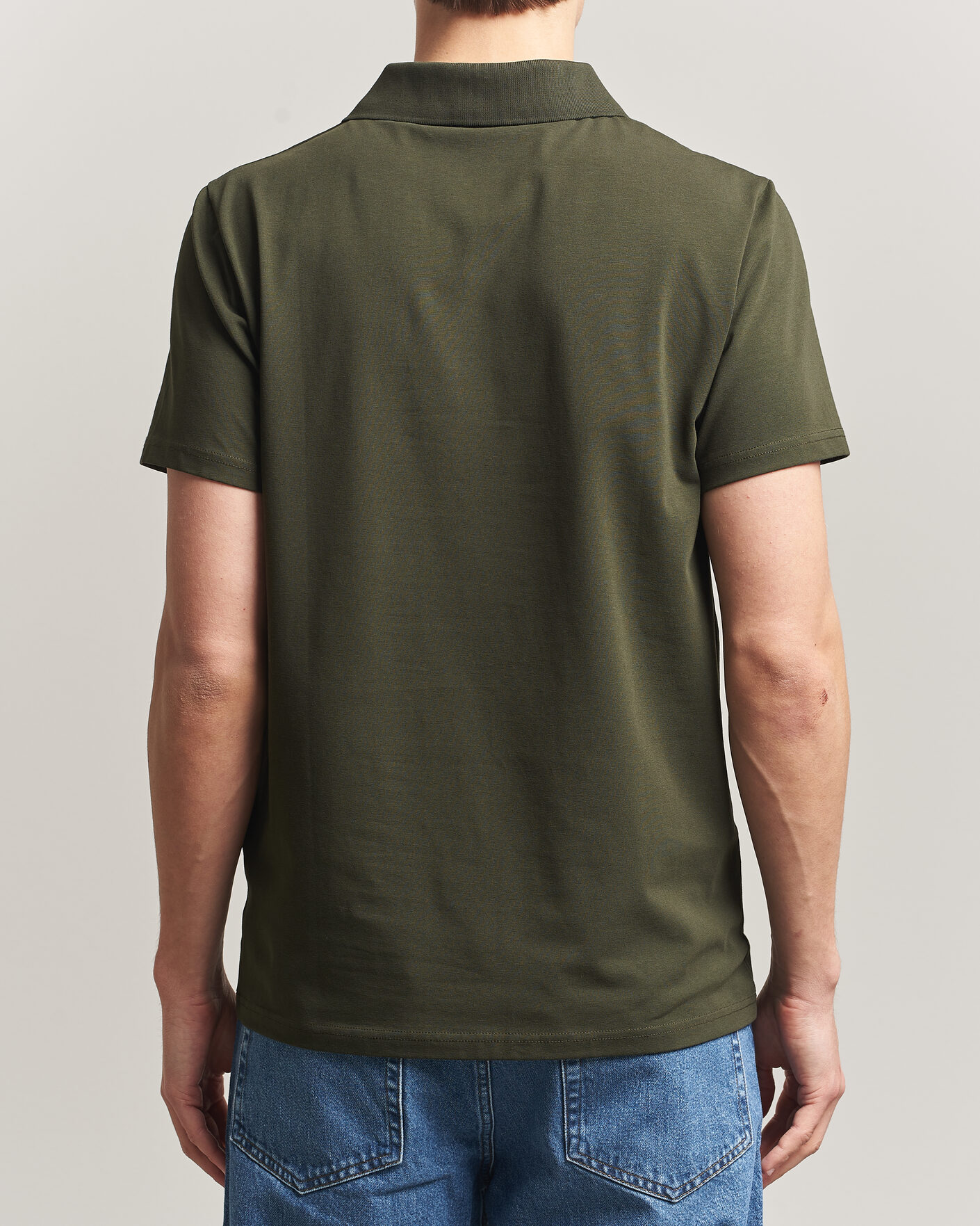 Men | Polo Shirts | Filippa K | Soft Lycra Polo T-Shirt Midnight Olive
