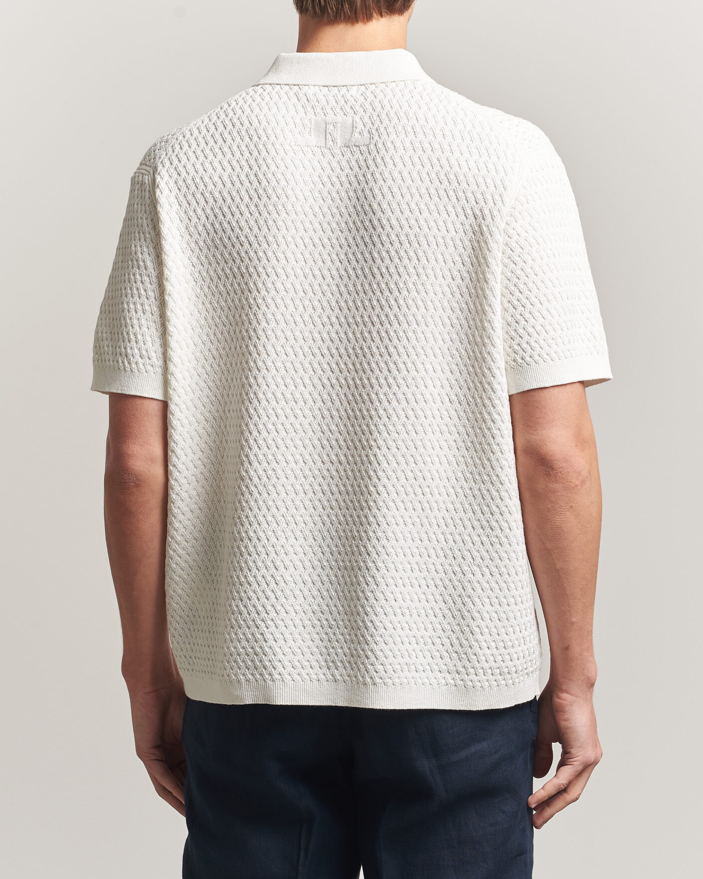 Men | Polo Shirts | J.Lindeberg | Jacques Structured Knitted Polo Tofu