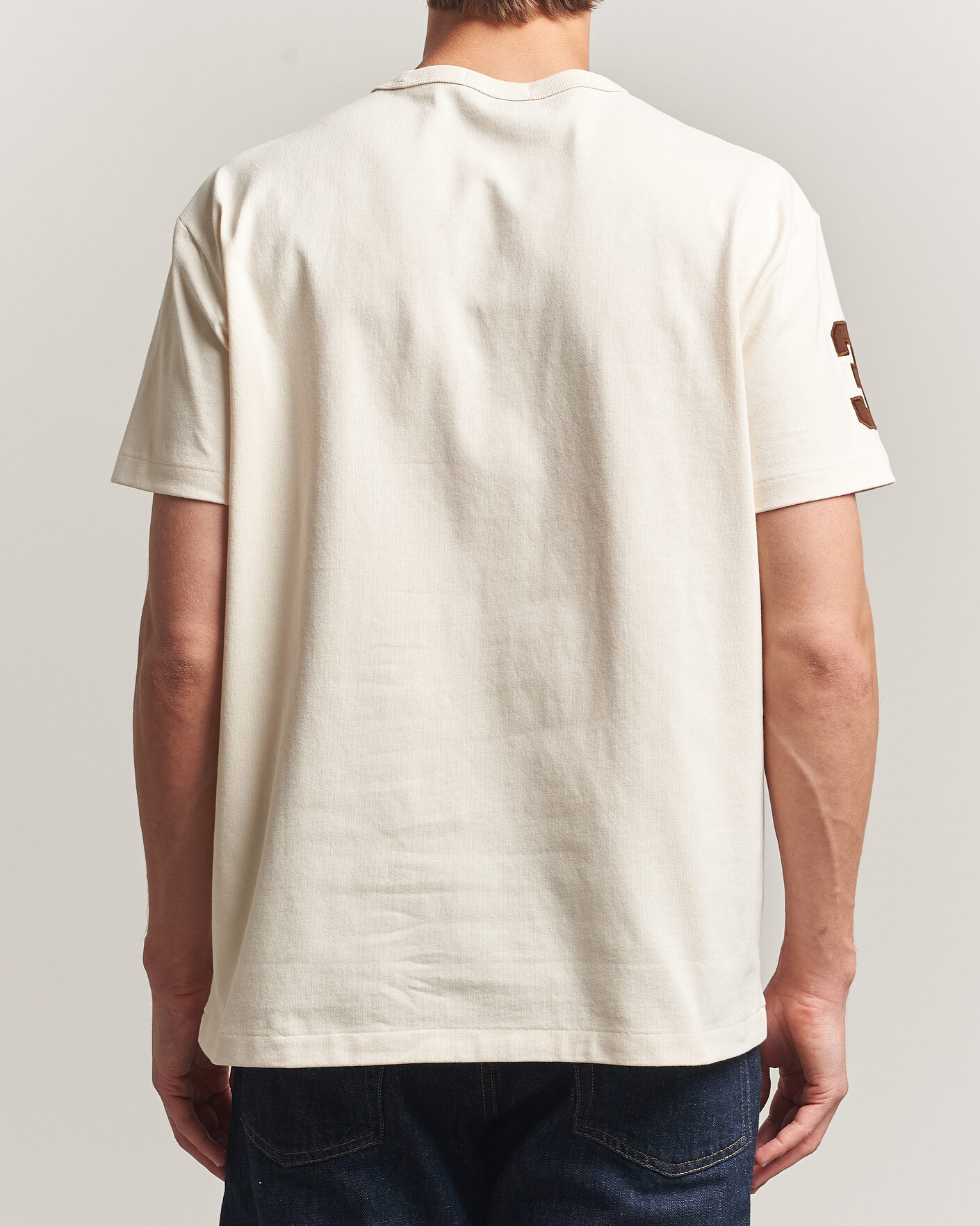 Men | T-Shirts | Polo Ralph Lauren | Classic Fit Team T-shirt Guide Cream