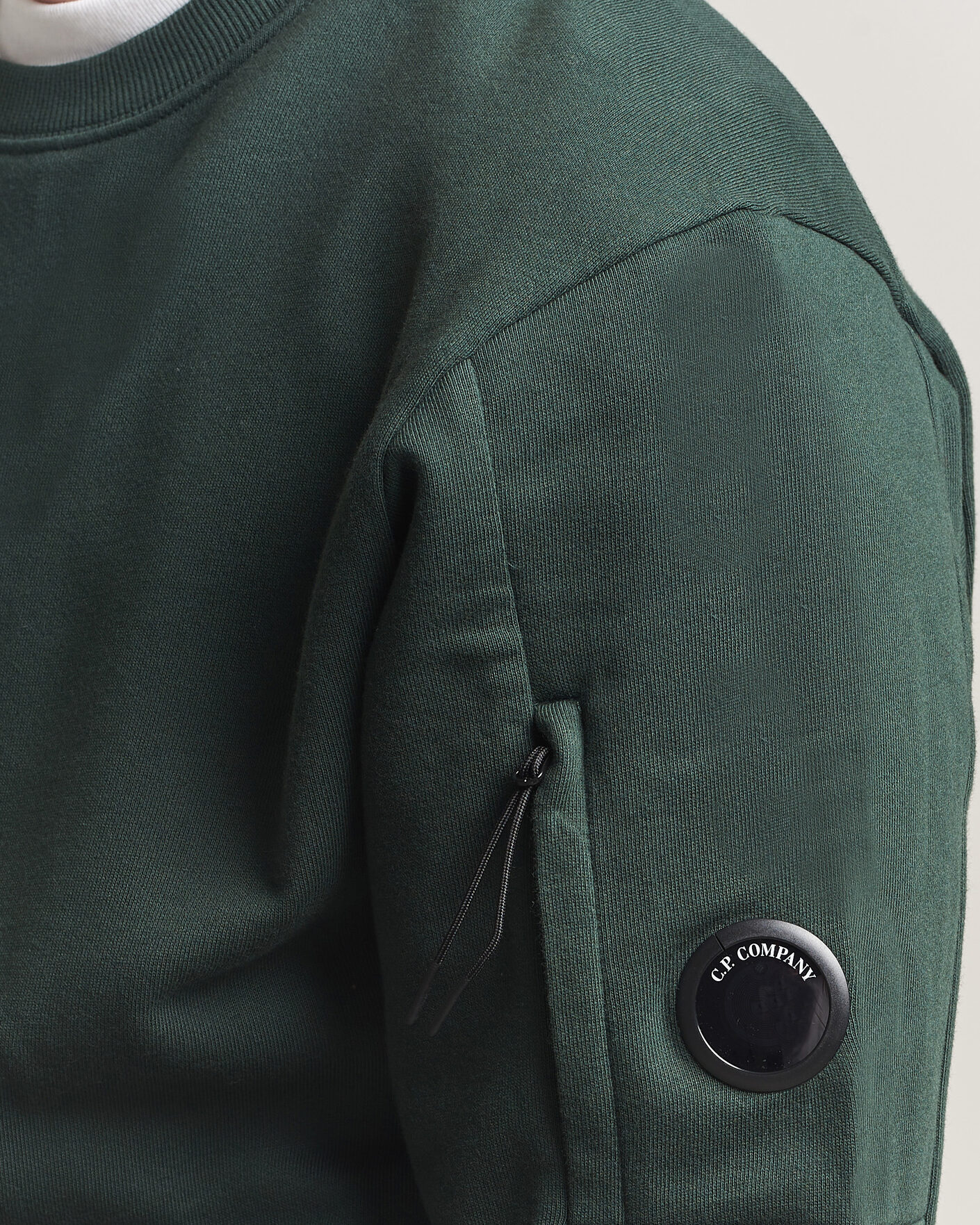 Men | Sweaters & Knitwear | C.P. Company | Diagonal Raised Fleece Lens Sweatshirt Emerald Green