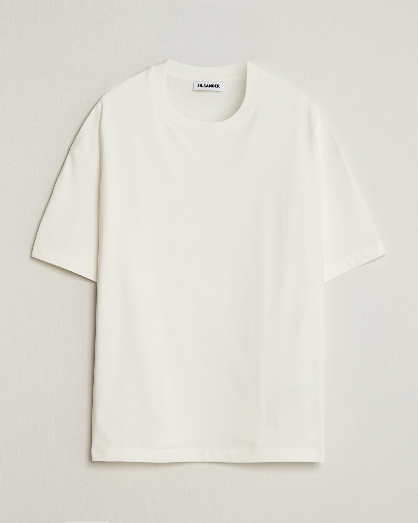 Jil Sander Short Sleeve Side Logo T-Shirt Off White at CareOfCarl.com