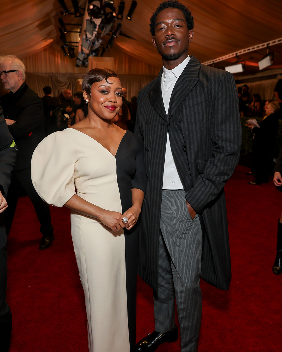 Damson Idris In Prada. Quinta Brunson In Gabriela Hearst, Jimmy Choo shoes, and Tiffany & Co. jewelry.