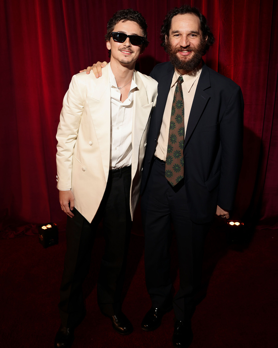 Josh Safdie and Timothée Chalamet In Prada and Christian Louboutin shoes.